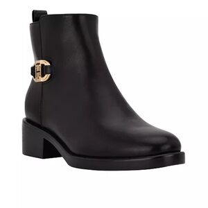 Black Leather Ankle Boots with Metallic Accent
In box, as good as as new.